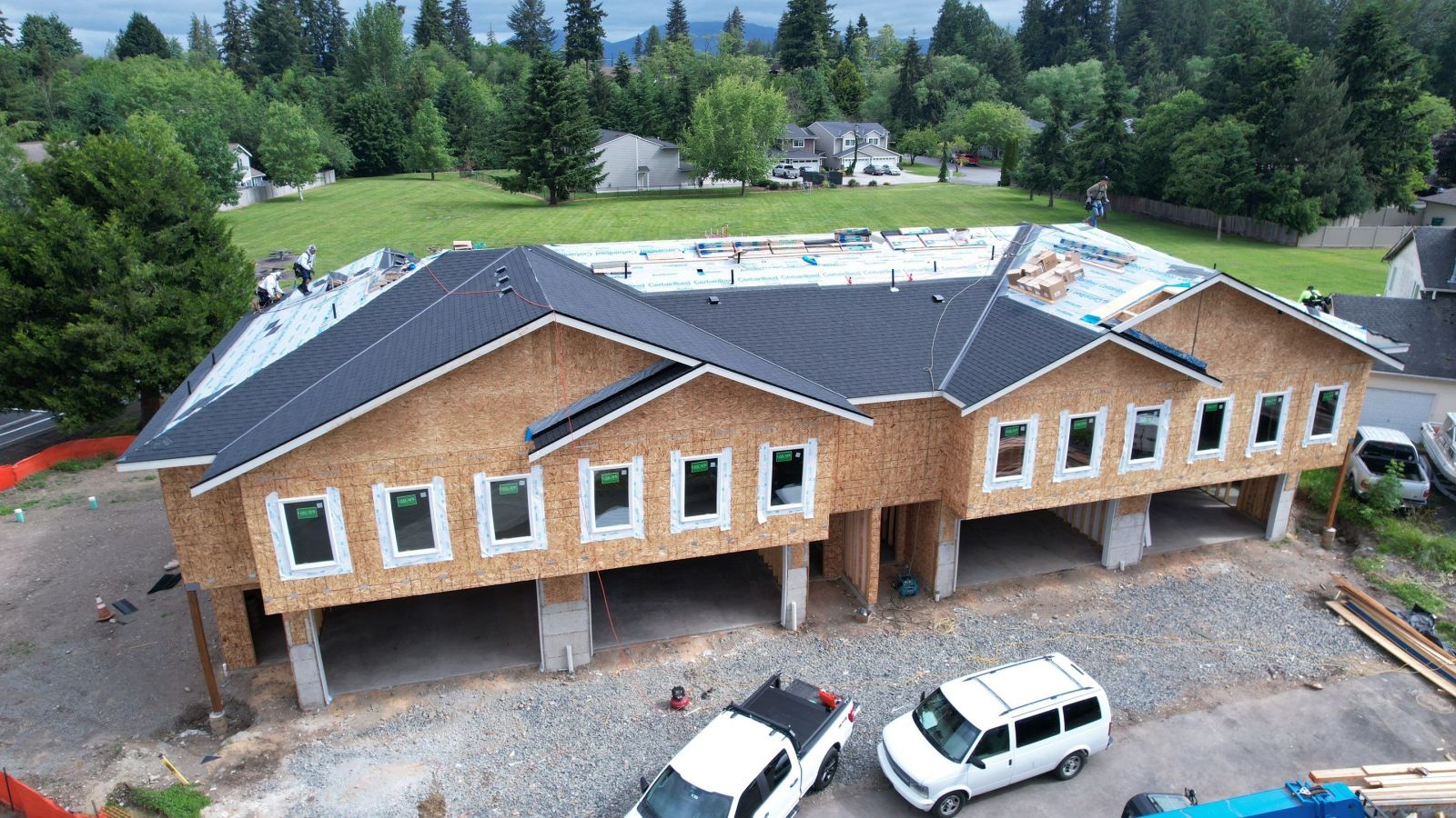 Metal RVO and flashing detail on an Arlington cinder black new-construction roof